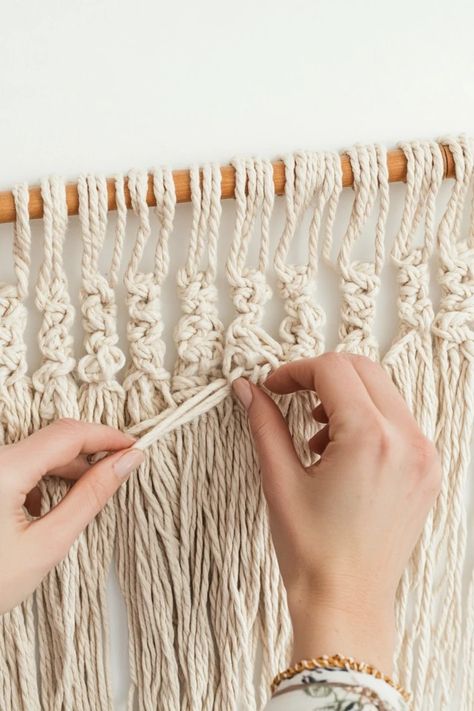 Want to add some boho charm to your home? This simple DIY macrame wall hanging tutorial will help you create a beautiful piece of decor with just a few materials. 🏡✨ #DIYMacrame #WallHangingTutorial #BohoDecor #HomeCrafts #EcoFriendlyDecor Macrame Diy Beginners, Diy Macrame Wall Hanging Tutorials, Simple Macrame Wall Hanging, Home Decor Macrame, Diy Macrame Wall Hanging, Diy Tapestry, Macrame Wall Hanging Tutorial, Easy Macrame, Herbs Garden