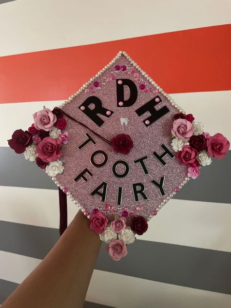 Celebrate your achievement in dental hygiene with a cap design that reflects your passion and dedication to the field. This unique cap design showcases your commitment to promoting oral health and wellness, featuring creative elements that symbolize your journey and the impact you will have on patients' lives. Dental Hygiene School Graduation Caps, Rdh Graduation Cap Dental Hygiene, Dental Assistant Graduation Cap Ideas, Dental Graduation Cap Ideas, Tooth Fairy Graduation Cap, Tooth Graduation Cap, Dental Hygiene Cap Decoration, Rda Graduation Cap, Dental Hygiene Grad Cap