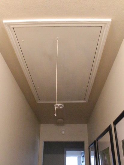 Get rid of that ugly cord hanging from your attic stairs Diy Stairs To Attic, Attic Cover Ceilings, Pull Down Stairs To Attic, Attic Drop Down Stairs, Attic Diy Ideas, Attic Door Cover Ceilings, Attic Trap Door Ideas, Attic Steps Pull Down, Attic Doors Ideas