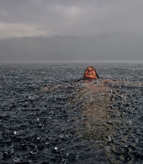 Swimming in the Rain - Lago Caburgua, Chile. Photo by Camila Massu Ocean Swim Aesthetic, Photos In The Rain, Floating In The Ocean, Favourite Aesthetic, Swimming Ocean, Swimming Sea, Ocean Swimming, Sea Swim, Lake Swimming