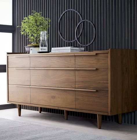 Our 1960s-inspired Tate collection recalls the timelessness of mid-century design with tailored profiles and streamlined shapes. Crafted of solid American walnut and walnut veneer, Tate showcases gallery fronts and linear undercut drawer pulls supported by tapered turned legs. Diy Chest Of Drawers, Diy Modern Furniture, Dresser Diy, Architecture Antique, Walnut Bookcase, 1960s Inspired, Dressers Makeover, Mid Century Modern Dresser, 9 Drawer Dresser