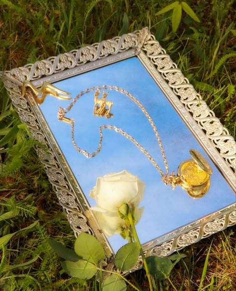 Dreamy aesthetic / cottagecore / nature / vintage jewelry / subscription box / gold locket / necklace / pendant / gold and pearl / broach / product photography / small business / michigan / outdoors photoshoot / mirror tray / blue skies / white rose / flower photography / jewelry Vintage Jewelry Shoot Ideas, Outside Jewelry Photography, Nature Jewelry Photoshoot, Picnic Jewelry Photoshoot, Outdoor Jewelry Photoshoot, Jewelry And Flowers Photography, Fun Jewelry Photography, How To Take Pictures Of Jewelry, Vintage Jewelry Photoshoot