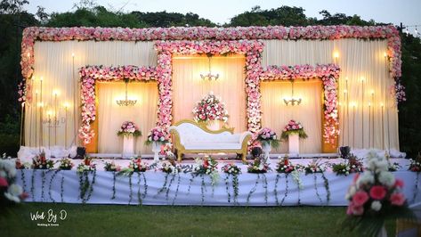 Dreamy Outdoor Reception stage backdrop with glamorous floral arches... Decor by @wedbyd.events Chennai Follow www.decorsutrablog.com for… | Instagram Outdoor Reception Stage, Reception Stage Backdrop, June Decorations, Arches Decor, Engagement Decorations Indian, Stage Decoration Photos, Event Wall, Engagement Stage, Indian Wedding Stage