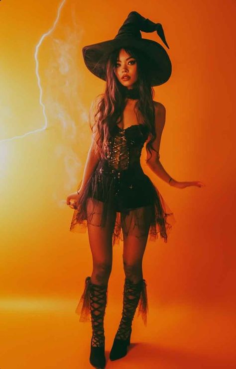 DIY Witch Costume Ideas for Women (Exclusive Ideas + the Best from Instagram) - The Mood Guide Witch And Cat Halloween Costume, Spooky Cute Costumes, Witch Costume With Corset, Witch Halloween Costume Corset, Pink Witch Halloween Costume, Witch Womens Costume, Hollowing Costumes Ideas, Pinup Witch Costume, Rave Witch Outfit