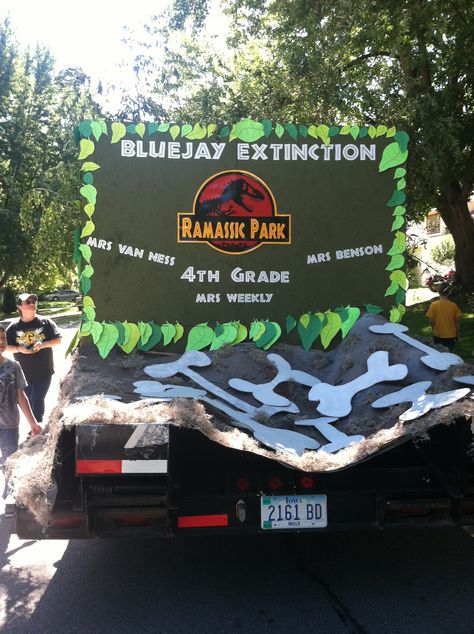 Jurassic Park float Jurassic Park Float Ideas, Jurassic Park Homecoming Float, Jurassic Park Parade Float, Stompers And Chompers Vbs 2023, Hoco Float Ideas, Float Themes, Dinosaurs Show, Homecoming Float Ideas, Parade Decorations