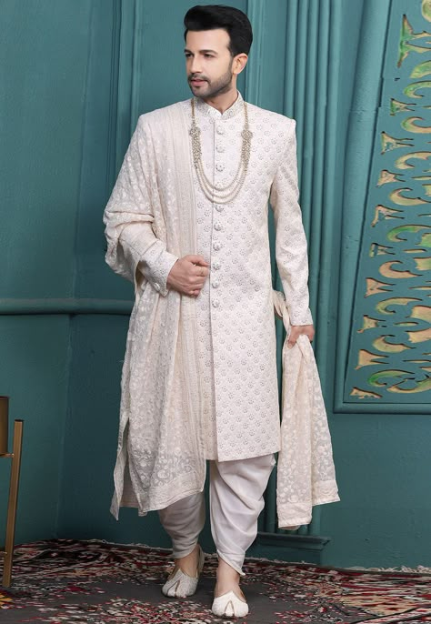 Art Silk Sherwani in Off White This attire is Enhanced with Buttons, Resham and Sequins Work, Crafted in Chinese Collar Neck and Full Sleeve Available with a Faux Georgette Dhoti Pant in Off White and a Faux Georgette Dupatta in Off White Do note: Kanthimala and Footwear shown in the image is for presentation purposes only. Half to one inch may vary in measurement. (Slight variation in actual color vs. image is possible) Engagement Dress For Groom, Outfits For Groom, Wedding Matching Outfits, Wedding Clothes For Men, Indian Groom Dress, Indian Wedding Clothes For Men, Wedding Dresses Men, Wedding Kurta For Men, Indian Wedding Clothes