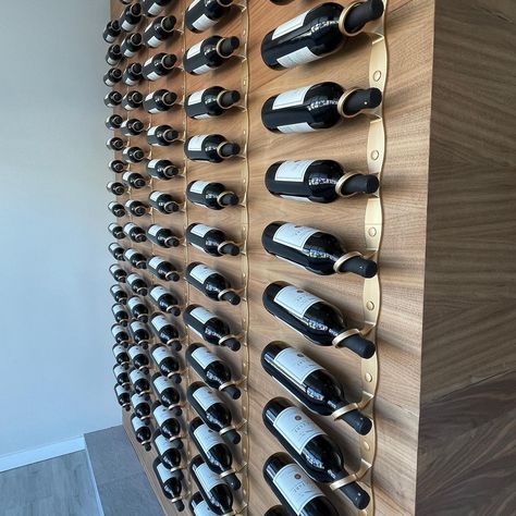 With its recent debut, Helix has already caused a stir in some of the most prestigious real estate properties and is making waves to steal the show. Our newest product is offering the most minimal way to store wine bottles on the wall. Location: The Reserve Luxury Wine Vault Design: Wine Cellar International Small Wine Storage, Wine Wall Display, Wine Cellar Cooling Unit, Wine Storage Wall, Wine Bottle Wall, Cellar Ideas, Hanging Wine Rack, Wine Closet, Wine Bottle Storage