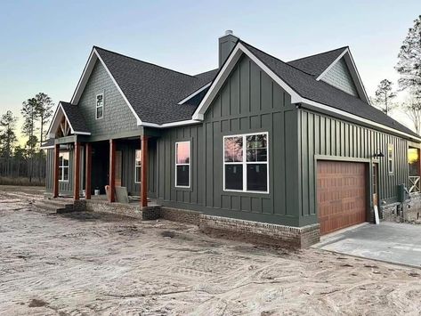 Exterior House Colors Single Story, Dark Green House With White Trim, Modern Farm Style House, Metal Siding And Roof Colors, House Colors Exterior With Black Roof, Siding On Houses Ideas, Green House White Windows, Simple Home Exteriors, Bedroom Wood Accent Wall Ideas