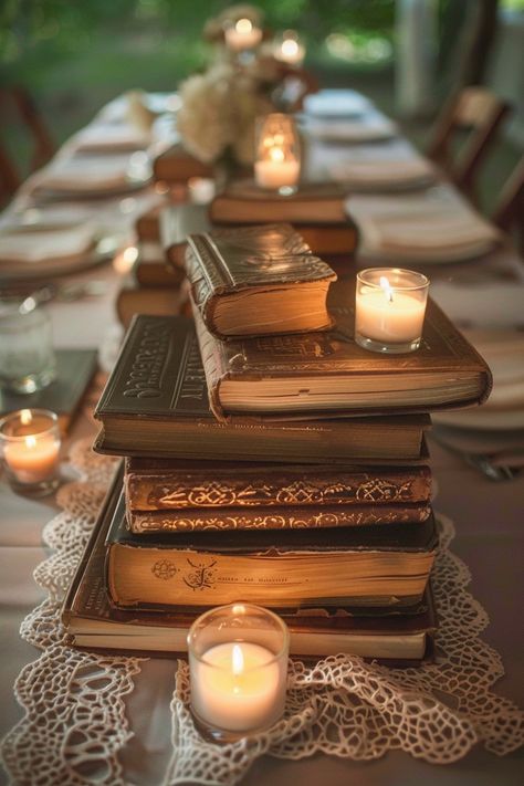 Transform your wedding tables into a storybook scene with our antique book centerpieces! 📚💒 Delicate lace runners and warm votive candles complete the romantic ambiance. Perfect for bibliophiles saying I do! #WeddingInspiration #VintageWedding #BookLover #RomanticDecor #WeddingIdeas #Candlelight #AntiqueChic #LaceDetails Let the love stories of old add charm to your special day! Elven Wedding Reception, Antique Wedding Inspiration, Antique Forest Wedding, Book And Candle Centerpieces, Magical Fall Wedding, Fortune Teller Wedding, Outdoor Spring Wedding Ideas Romantic Table Settings, Vintage Guest Book Table For Wedding, Rustic And Elegant Wedding Decor