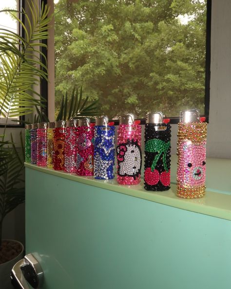 Bedazzle lighters DROP IS LIVE NOW!!! ⭐️⭐️⭐️ there is only 1 of each design available… website in bio Bedazzled Designs, Bedazzle Lighter, Blinged Out Lighter, Lighters Decorated Diy, Decorated Lighters Gems, Rhinestone Lighter, Diy Decorate Lighter, Cool Lighters, Rhinestone Art