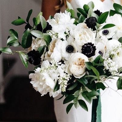 WEDDINGS | BEST BRIDE on Instagram: "This beautiful bouquet is filled with white anemones, peonies, baby’s breath, and greenery. White anemones are the perfect flower to add to your bouquet for a black and white wedding. 🖤 @bestbride_ @albadahliafloral @grantdaniels" Olive Wedding Theme, Black Theme Wedding, Black And White Wedding Decor, Snowboard Wedding, Wedding Anniversary Photoshoot, Flower Anemone, Timeless Wedding Decor, White Bridal Flowers, Modern Bridal Bouquets