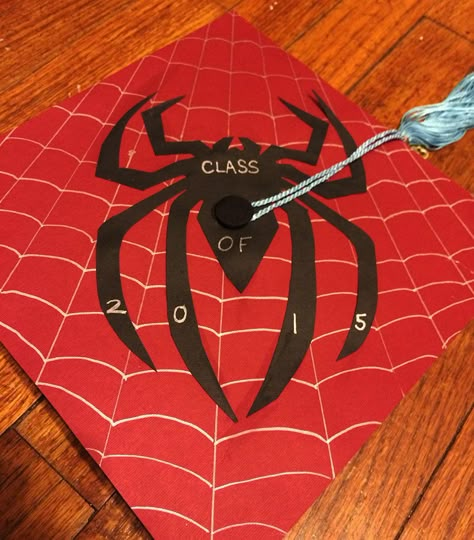 Spiderman graduation cap (University of South Carolina colors) Hot Wheels Graduation Cap, Simple Grad Cap Ideas For Guys, University Cap Decoration, Graduation Caps Ideas For Guys, Superhero Graduation Cap, Graduation Cap Decoration For Guys, Dragon Ball Graduation Cap, Spiderman Grad Caps, Spider Man Grad Cap