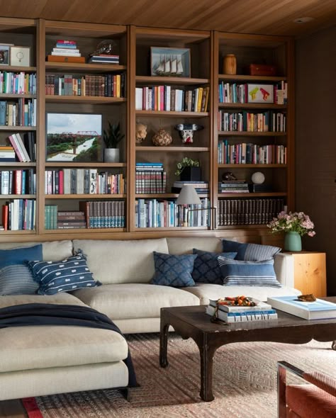 Built In Window Shelves, Walnut Bookshelves Built Ins, Bookcase Behind Sectional Couch, Lights In Built In Shelves, Bookcase Wall Behind Sofa, Cottage Built In Bookcase, Built In Bookshelf Vaulted Ceiling, Above Couch Bookshelves, Living Room With Bookcase Wall