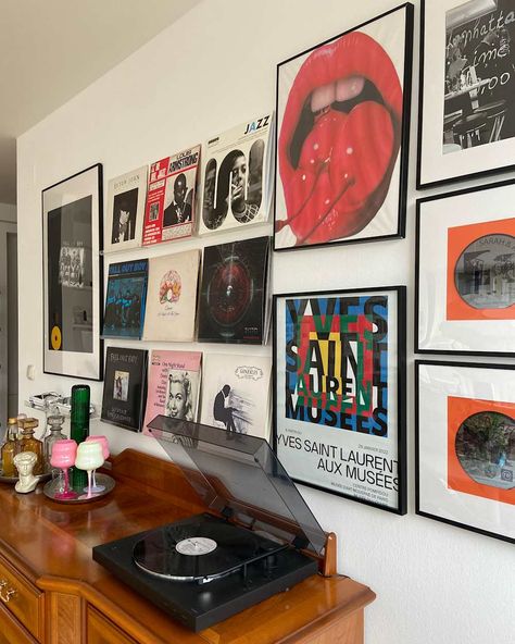 Wood credenza with turntable and records hanging on wall with other framed art Maximalist Rental, Artsy Decor, Framed Records, Inexpensive Art, Wood Credenza, Anthropologie Home, Rental Apartment, Gorgeous Houses, Colored Ceiling