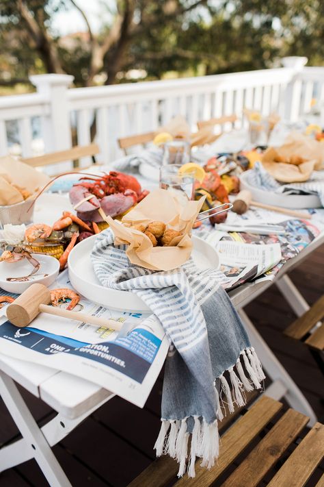 Outdoor Dining Crab  Shrimp Seafood Feast ideas with beautiful backyard styling! Seafood Boil Party Table Settings, Crab Feed Party, Surf And Turf Dinner Party, Backyard Styling, Housewarming Party Themes, Seafood Night, Aviation Pictures, Crab Feed, Crab Party