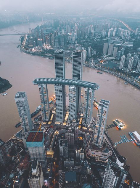 Moshe Safdie, Singapore Guide, Sky Bridge, Indoor Waterfall, Chongqing China, Skyscraper Architecture, Tower Building, Tall Buildings, Living Modern