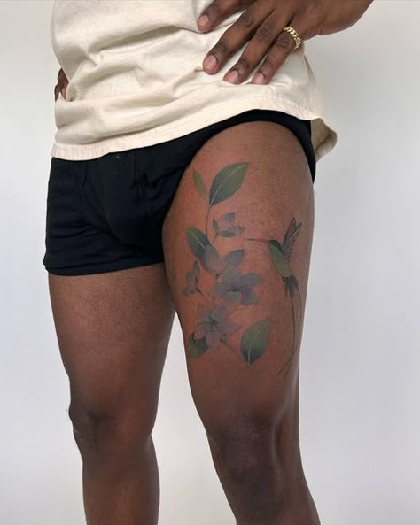 jess chen on Instagram: "Lignum vitae flowers and a sweet doctor bird, thank u @darren.lee 💜" Jess Chen Tattoo, Floral Tattoo Dark Skin, Color Tattoo Black Skin, Lignum Vitae Tattoo, Green Tattoo On Dark Skin, Doctor Bird Tattoo, Flower Garden Tattoo, Art Reference Outfits, Color Tattoos On Dark Skin