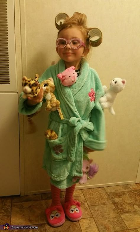 Stephanie: My 4 year old daughter Ava Grace dressed as the Crazy Cat Lady. She is an avid cat lover! We used a bathrobe and slippers we already had. We attached... 2023 Costume Trends, Whimsical Costumes For Women, Corporate Halloween Costumes, Girl Halloween Costumes For Kids, Crazy Cat Lady Halloween Costume, Girls Halloween Costumes For Kids, Crazy Cat Lady Halloween, Work Costume Ideas, Crazy Cat Lady Costume