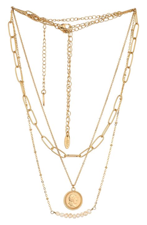 Gold necklace layered