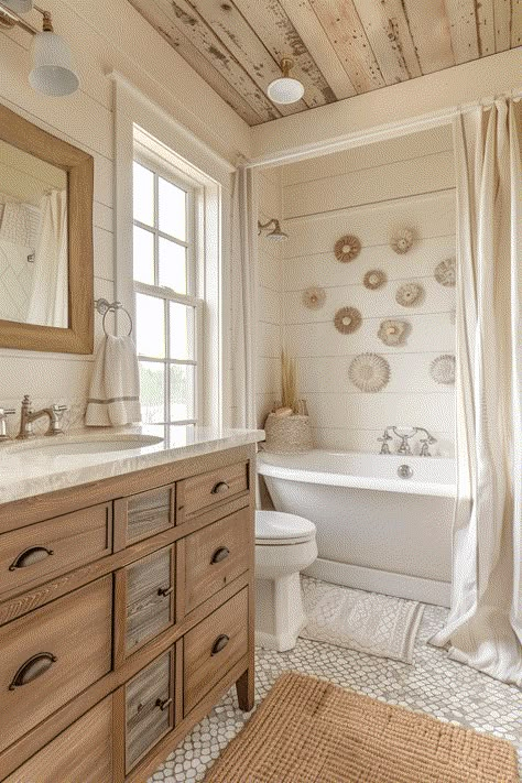 38+ Coastal Bathroom Ideas to Create Your Own Seaside Retreat Cozy Cottage Bathroom, Coastal Master Bath, Southern Bungalow, Coastal Cottage Bathroom, Coastal Farm House, Cottage Bathroom Design Ideas, Coastal Farmhouse Bathroom, Stone Shower Floor, Cabin Basement