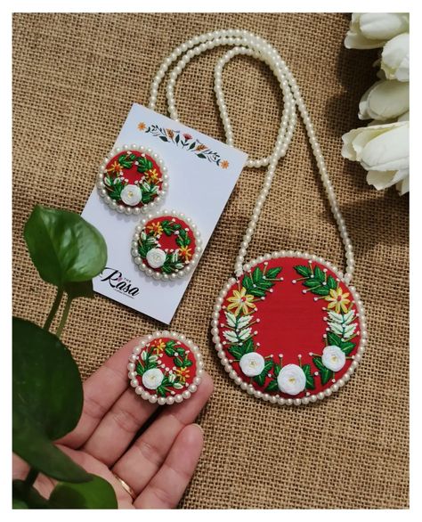 The OG set!! ❤️ Nothing dims the brilliance of a red and white combination— pure simplicity and elegance shining through in every detail. Customisable in any color. DM for details! . . . . . . . . . . . . [New launch, jewelry collection, handmade jewelry, statement jewelry, handmade neckpiece, hand embroidery, necklace, embroidery design, jewelry lover, unconventional jewelry, designer jewellery, fabric jewellery, textile jewelry, embroidery jewelry, embroidery jewelry set, necklace, necklace... Embroidery Jewellery Handmade, Handmade Jewellery Design, Cloth Jewellery Handmade, Embroidery On Red Fabric, Fabric Jewellery Handmade, Fabric Jewelry Handmade, Unconventional Jewelry, Handmade Fabric Jewelry, Hand Embroidery Jewelry