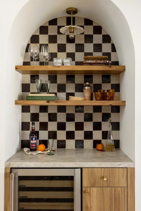 This California Kitchen Is Like a Quaint Postcard From Italy | Architectural Digest 50s Inspired Interior Design, Tile Floating Shelves, Fun Tile Kitchen, Event Space Kitchenette, Funky Decor Ideas, Unique Home Renovations, Tiled Dresser Top, Black And White Retro Kitchen, Black And White Tile Kitchen Backsplash