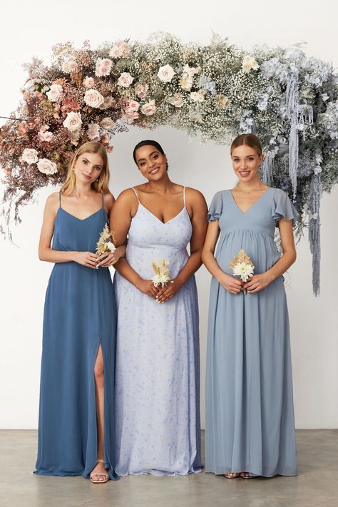 We dreamed up the PRETTIEST CAPSULE COLLECTION with our friends at Birdy Grey, adorned with painterly blooms that are perfect for mixing and matching. #stylemepretty #birdygrey #bridesmaiddresses #bridesmaids Bridesmaid Dresses Floral Print, Floral Gowns, Printed Bridesmaid Dresses, Grecian Dress, Bridal Squad, Wedding Roles, Blue Wedding Ideas, Blush Bouquet, Floral Bridesmaid Dresses