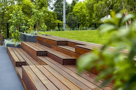 Terraced seating at our half-court basketball court project. Tiered Garden Ideas, Exterior Wall Decor, Outside Dining Table, Landscape Stairs, Tiered Seating, Outside Dining, Deck Seating, Concrete Bench, Backyard Seating