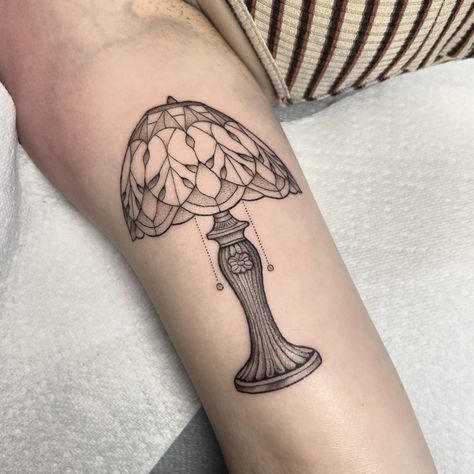 Beautiful custom stained glass lamp tattoo for Marissa, tysm! I’d love to do more like this, submit a form on my website to request an appointment 🌷 . . . . . . #tiffanylamp #lamptattoo #stainedglasslamp #hamptonroadstattoo #757tattoo #757tattoos #vatattooartist #757tattooartist #virginiatattooartist #norfolkvatattoo #norfolktattoo #virginiatattooshop #vabeachtattoo #virginiabeachtattoo #757tattooshops Black And Grey Stained Glass Tattoo, Stained Glass Tattoos For Women, Stained Glass Lamp Tattoo, Stained Glass Tattoo Design, Stained Glass Tattoo Black And White, Tiffany Lamp Tattoo, Stain Glass Tattoo, Stained Glass Window Tattoo, Virginia Tattoo