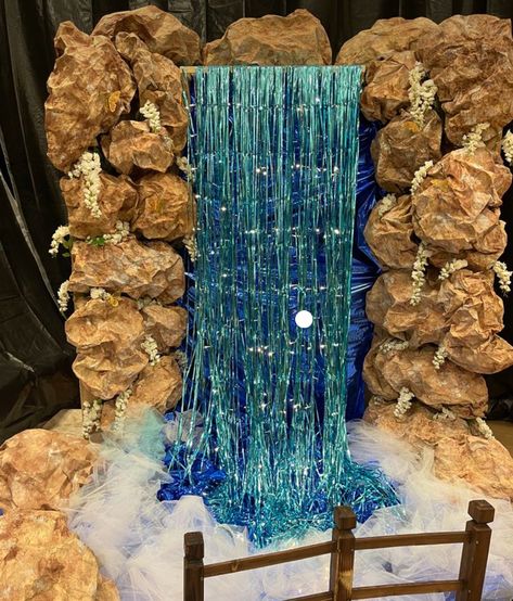 Fake Waterfall Diy, Enchanted Forest Prom Decorations Diy, Fake Waterfall Decoration, Waterfall Decoration Ideas, Waterfall Set Design, Enchanted Forest Parade Float, Waterfall Diy Decoration, Enchanted Forest Props Diy, Fairytale Decorations Enchanted Forest