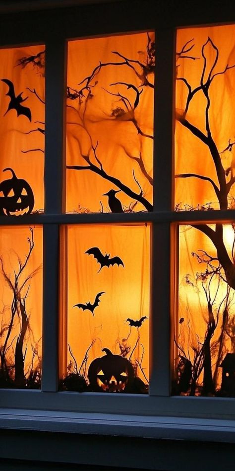 Spooky silhouettes for spine-chilling Halloween window decorations! Create an eerie scene with black cardstock cutouts of witches, bats, and creepy trees. Backlight your designs with flickering LED candles or string lights for a haunting glow. Add depth by layering multiple cutouts and using different shades of translucent paper. Incorporate moving elements like swinging ghosts or rotating owl eyes for extra fright. These shadowy displays will transform your windows into portals to a world of Ha Halloween Shadow Window, Halloween Witch Window Display, Halloween Silhouettes Window, Window Silouhette Halloween Diy, Halloween Sillouette Art Window, Halloween Monster Window Silhouettes, Halloween Window Silhouettes, Halloween Window Display, Halloween Window Decorations