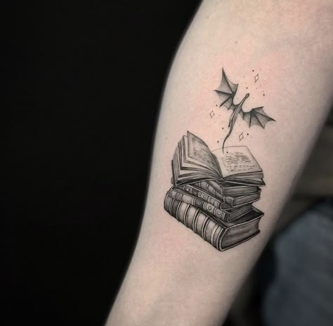 Tattoo Idea For Book Lovers, Book Tattoos With Dragons, Fantasy Book Inspired Tattoos, Fantasy Reading Tattoo, Bookish Tattoos Dragon, Book And Travel Tattoo, Tattoos For Fantasy Book Lovers, Book With Dragon Tattoo, Realism Book Tattoo