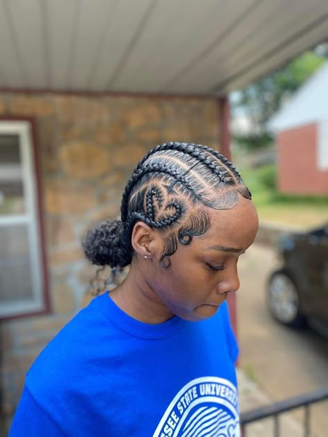 All Back Conrow With Heart, Cornrow Hairstyles With Designs, 5 Stitch Braids In A Bun, Straight Backs Feed Ins Into Two Buns, Straight Back Cornrows With Bun, Feed In Braids With Bun In Back, Stitch Braids Into Bun With Heart, Feedin Braid Styles For Black Women, 8 Feed In Braids With Designs