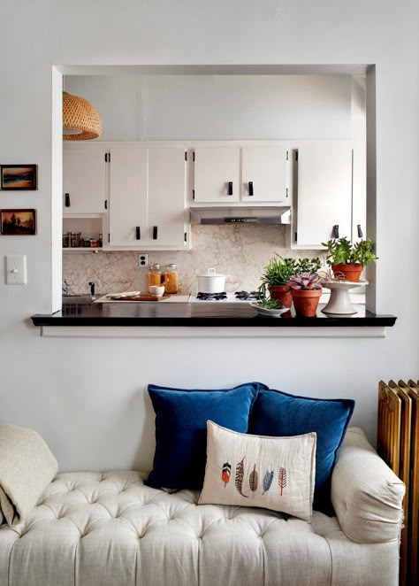 Our Small Feathers Pillow sits nicely in Amy Azzarito's beautiful apartment featured in The New York Times Great Homes and Destinations! Take a look - NYTimes.com To Purchase: https://www.coralandtusk.com/catalog/product/view/id/3891/s/small-feathers-pillow/ Window Connecting Kitchen And Living Room, Kitchen Cutout To Living Room, Undining Room Ideas, Kitchen Hatch, Wall Between Kitchen And Living Room, Serving Hatch, Kitchen Pass Through, Kitchen Pass, Sf Apartment