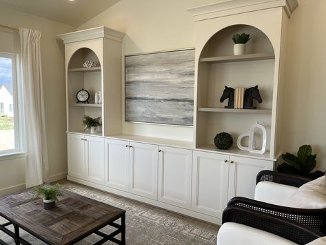 Entertainment Shelving, Tv Under Stairs, Living Room No Tv, Family Bonus Room, Townhome Living Room, Wall Shelves Ideas, Arched Bookshelf, Wall Behind Sofa, New Build Interior