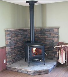 Hearth idea for pellet stove in kitchen sitting area. Woodstove Ideas, Pellet Stove Ideas, Wood Burning Stove Corner, Corner Wood Stove, Wood Stove Surround, Stove Surround, Wood Stove Ideas, Stove Hearth, Hearth Ideas