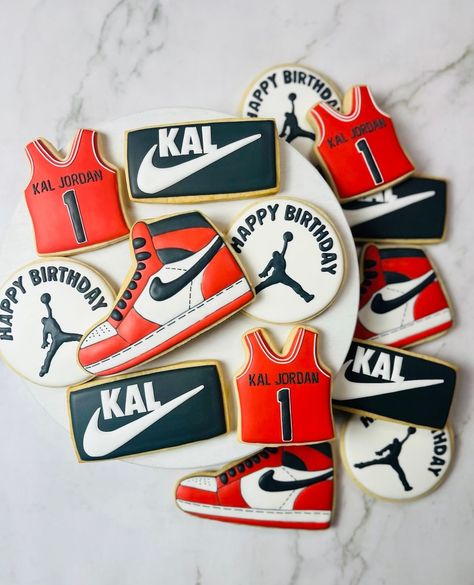 Let's make their first birthday a slam dunk! Order custom cookies that are perfect for your little one's theme!⁠ ⁠ ⁠ ⁠ ⁠ #dallascookies #dallasbaker #greatonecookies #decoratedcookies #dallascustomcookies #edibleart #cookieart #corporategifting #royalicingcookies #dfwcookies #dfwcustomcookies #dallaseventplanner #dallascookiecake #customcookiecake #shoecookies #nike #nikecookies #sportscookies #basketballcookies #firstbirthdaytheme #firstbirthdaycookies #marchmadness Nike 1st Birthday Party Ideas, 15 Birthday Boy Party Ideas, Nike First Birthday Theme, Jordan 1 Birthday Theme, First Kickback Birthday Theme, Treat Table Ideas Birthday, Nike Theme Party Birthdays, Nike Themed Party Ideas, Nike Cookies