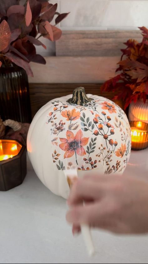 This DIY Napkin Pumpkin is an easy way to decorate faux pumpkins with your favorite fall napkins. Pumpkin Napkin Decoupage, Napkin Decoupage Pumpkin, Diy Decoupage Pumpkins, Christian Painted Pumpkins, Decopodge Pumpkin, Decopauge On Pumpkins, Napkin Pumpkin Decoupage Ideas, Modge Podge Napkin Pumpkin, Pumpkin Floral Painting