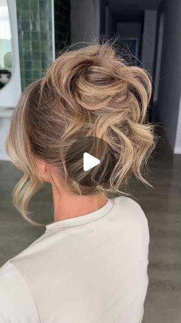 Salons Direct on Instagram: "YOUR HAIR UP INSPO ⚡⁣ ⁣ Watch as the talented @chantellemareehair shows you how to create this effortless, soft high bun on your clients. ⁣ ⁣ She uses the ghd Helios and Soft Curl Tong to prep the hair, available at salonsdirect.com 🙌⁣ ⁣ Don't forget to press the SAVE button & recreate this look for your clients next night out 💎⁣ --⁣ ⁣ #salonsdirect #hairup #updo #updohairstyle #ghd #ghdhelios #ghdsoftcurltong #hairupdo #hairtutorial #hairtutorials #hairstyletutorials" How To Messy Updo Long Hair, Formal Buns For Long Hair, Loose Hair Up, Messy Bun For Wedding Guest, Effortless Updo Wedding, High Messy Bun Updo Wedding, Messy Hair Updo Wedding, High Hair Updos Wedding, High Loose Updo