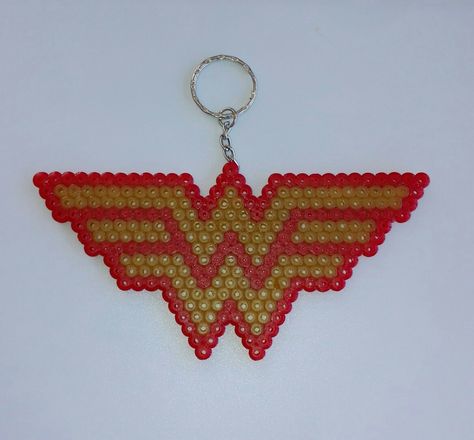 Wonder Woman Wonder Woman Perler Bead Patterns, Wonder Woman Perler Beads, Aquabeads Ideas, Wonder Woman Jewelry, Easy Perler Bead Patterns, Keeping Busy, Female Symbol, Perler Ideas, Perler Bead Ideas