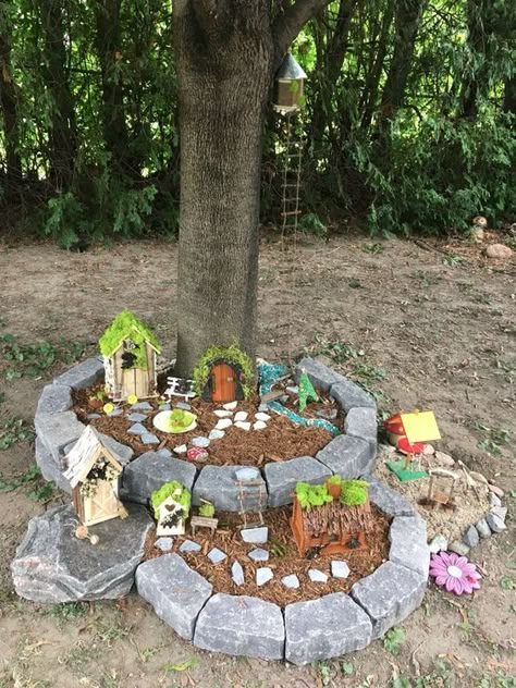 Fairy Garden Stone House Diy, Fairy Garden Neighborhood, Fairy Front Yard, Tree Area Ideas, Fairy Garden Ideas Around Tree, School Fairy Garden, Large Garden Ideas Landscaping Backyards, Fairy Garden In Backyard, Fairy Garden Around A Tree