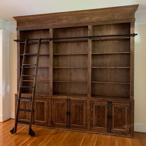 Ladder Library Bookshelves, Home Library Bookcases, Walnut Bookcase Built In, Home Library Chairs, Old Fashioned Bookshelves, Built In Library Wall With Ladder, Custom Bookcases Built Ins, Antique Built In Bookcase, Victorian Gothic Bookshelf