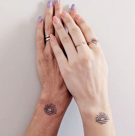 20 Meaningful Mother and Daughter Tattoos - The Trend Spotter Mother Daughter Tats, Tattoos To Honor Mom, Mommy Daughter Tattoos, Daughter Tattoo Ideas, Sunflower Tattoo Thigh, Sunflower Tattoo Simple, Colored Tattoos, Mom And Daughter Tattoos, Sunshine Tattoo