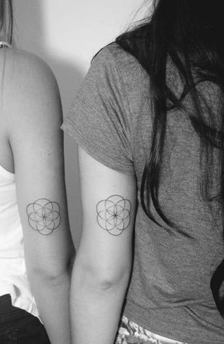 30 Beautiful Flower Tattoos for Women & Meaning - The Trend Spotter Beautiful Flower Tattoos For Women, Seed Of Life Tattoo, Coldplay Tattoo, Dainty Flower Tattoos, Flower Tattoos For Women, Flower Of Life Tattoo, Simple Flower Tattoo, Magnolia Tattoo, Sacred Geometry Tattoo