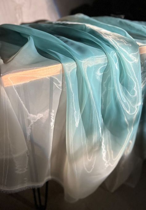 "* Width 57 inch (145cm), listed for 18\" x 57\" (45cm x 145cm). This size is measured on straightened fabric. * Fabric: Polyester organza fabric. Blue and white gradient .Translucent.  * Multiple quantities will come as continuous lengths, one big piece. The sky blue gradient light sense organza is a delicate and ethereal fabric that features a beautiful transition of colors. This lightweight, sheer material is made from synthetic fibers, giving it the subtle shimmer.The fabric have delicate fe Sky Blue Gradient, Ethereal Fabric, Translucent Fabric, Gradient Light, White Gradient, Blue Organza, Ombre Fabric, Purple Mirror, Blue And White Fabric