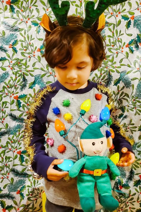 Kids Christmas Ugly Sweater Ideas, Crazy Sweater Ideas For Kids, Easy Ugly Christmas Sweater Diy Kids, Tacky Sweater Ideas For Kids, Diy Ugly Sweater Ideas For Kids Easy, Diy Kids Ugly Sweater, Ugly Sweater Ideas For Kids Boys, Diy Tacky Christmas Sweater For Kids, Ugly Sweater Ideas Kids