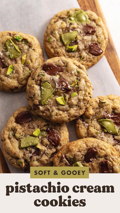 These pistachio cream cookies are soft and gooey cookies stuffed with creamy pistachio spread with melty chocolate chunks. They're packed with pistachio flavour and the most decadent cookies especially when enjoyed warm! #cookies #pistachio | teakandthyme.com Ways To Use Pistachio Cream, Pistachio Cream Chocolate Chip Cookies, Pistachio Cookies Pudding, Pistachio Amaretti Cookies, Pistachio Baked Goods, Dark Chocolate Orange Cookies, Pistachio Paste Cookies, Homemade Christmas Cookie Box Ideas, Pistachio Cream Recipe Desserts