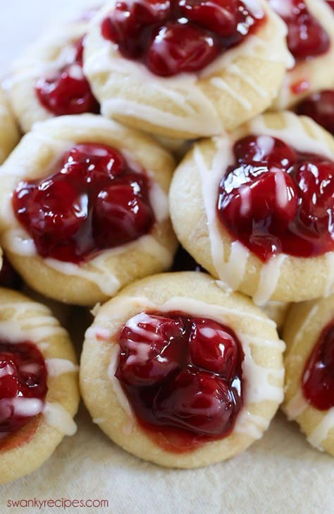 Cherry Pie Cookies - These cookies are made with sugar cookie dough and feature cherry pie filling. Our family loves these cookies! #cookies #cherrypie #dessert Thumbprint Cookies With Icing, Cherry Pie Cookies, Almond Sugar Cookies, Cookies Chewy, Thumbprint Cookies Recipe, Cherry Cookies, Pie Cookies, Cherry Desserts, Frozen Cookies