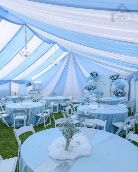 30x40 Tent and Drapes for Baby Rico’s Baby Shower 💙 . Rentals : 30x40 tent and drapes with silver chandeliers Candy Cart with Silver Dessert Stands and Balloons Arch Walls with Balloons and Custom Vinyl Sign Round tables with tablecloth and white padded chairs . Client provided table decor 💙 . #tent #draping #babyshower #blue #white #party #rentals Party Tent Decorations, Tent Baby Shower, Shadi Decor, Tent Draping, Wedding Tent Decorations, Dessert Stands, Round Table Decor, Birthday Carnival, Round Table And Chairs