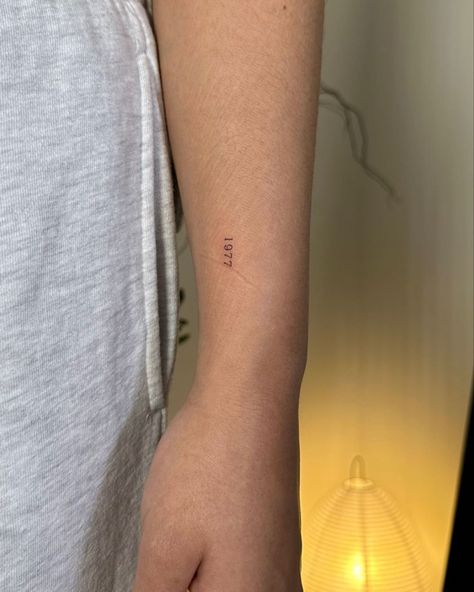 Family Written Tattoo, Numbers On Wrist Tattoo, Fine Line 11:11 Tattoo, Year Number Tattoo, 70 Times 7 Tattoo, Number Tattoo Aesthetic, Number Tattoo Fine Line, 1936 Tattoo, Dainty Family Tattoos